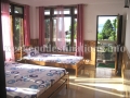 Triple bedroom at Takdah Heritage Guesthouse